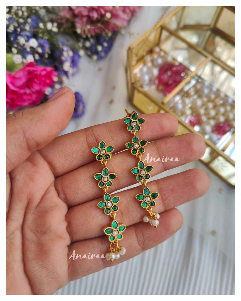 Jadau floral earrings