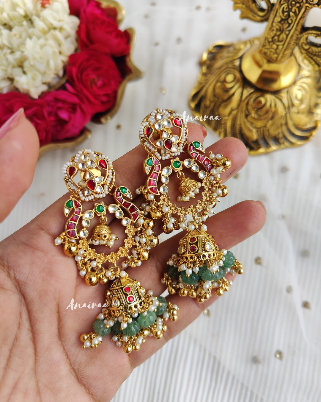 Yuvika Kundan jhumkas with earchains