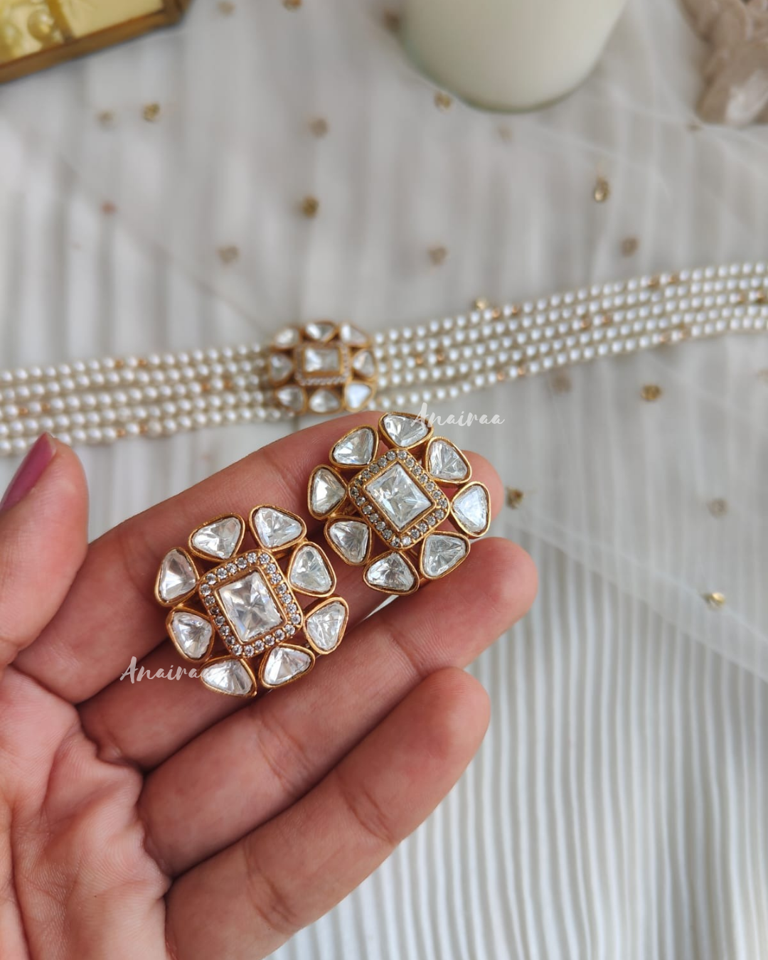 Polki pearl choker with marching studs