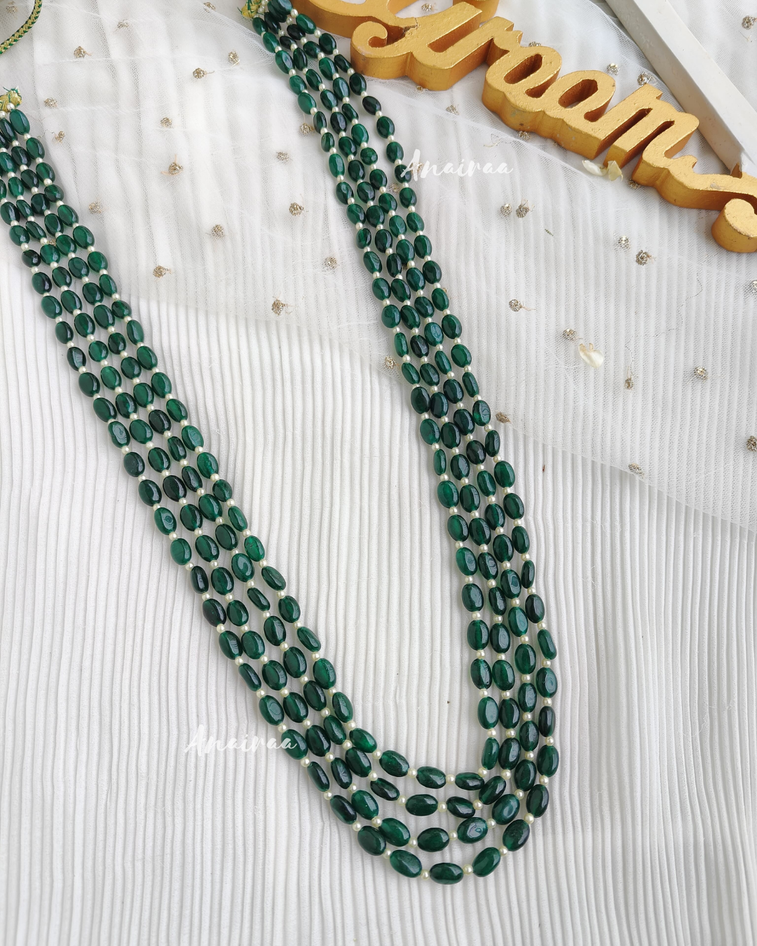 Emerald beads groom haar