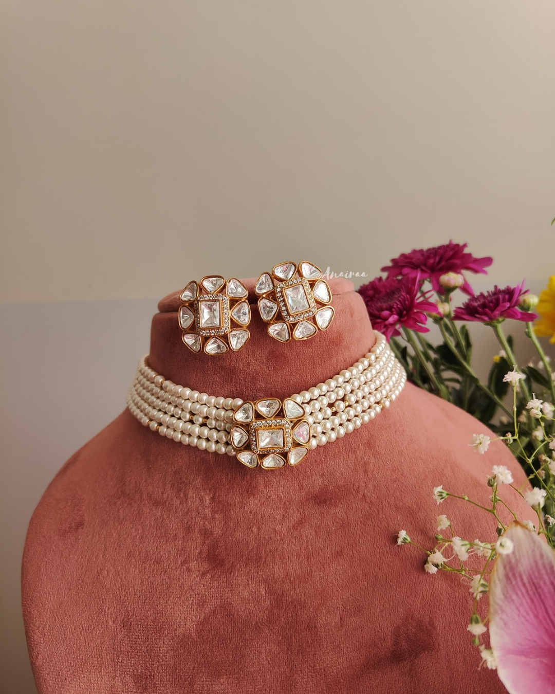 Polki pearl choker with marching studs